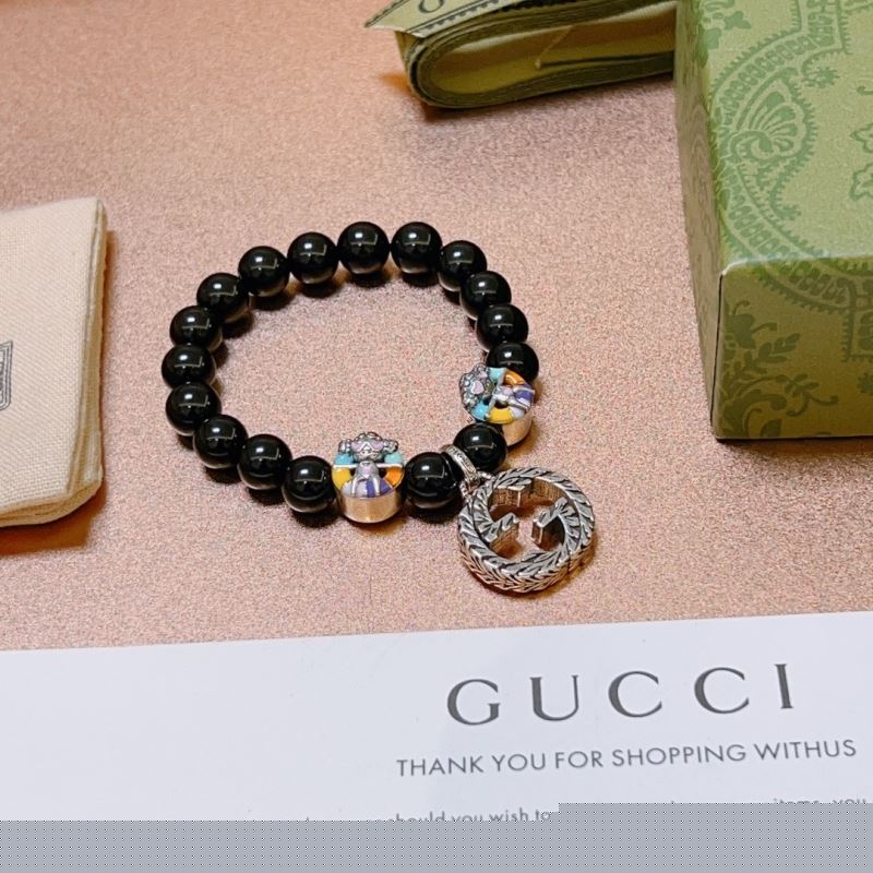 G*u*i bracelets